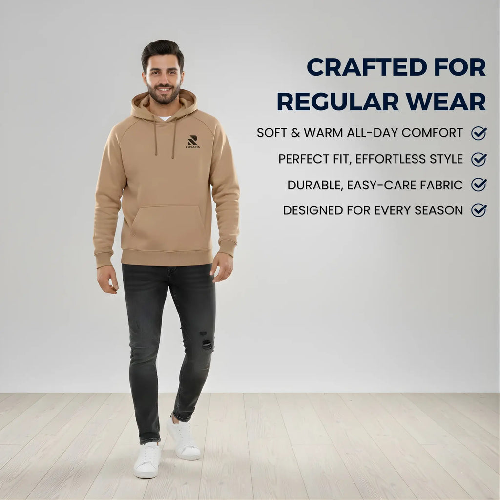 Man wearing a beige hoodie with text about the hoodie's features on a white background