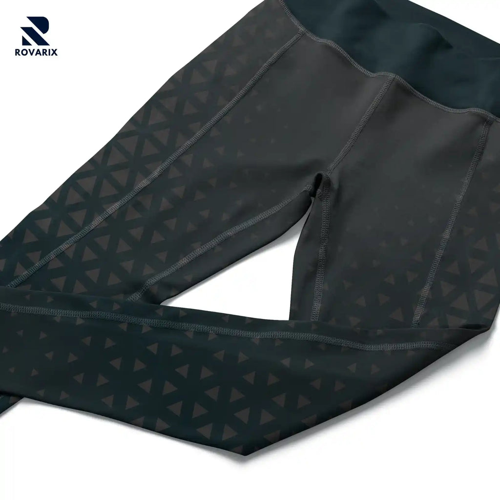 Rovarix dark teal leggings showing hidden waistband pocket and geometric triangle pattern detail