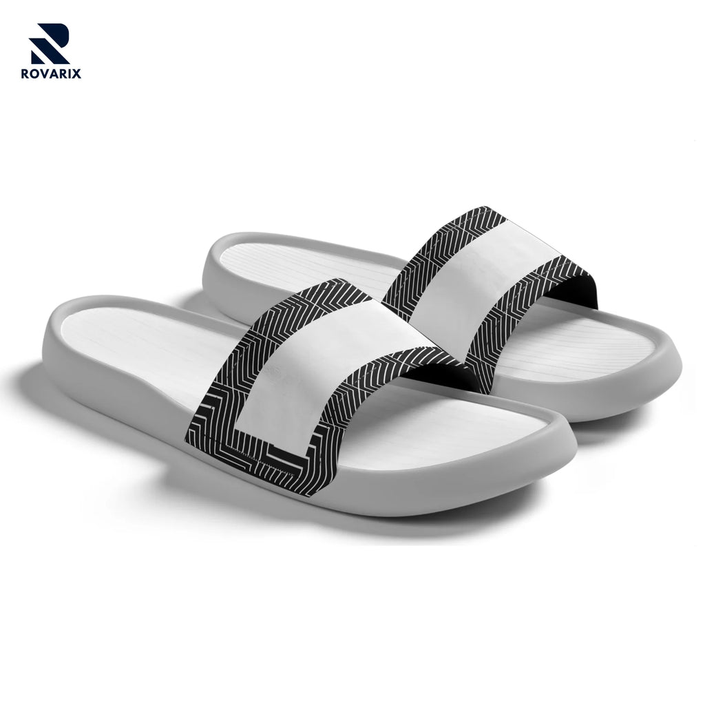 Rovarix white slide sandals with black geometric pattern straps and cushioned massage footbed